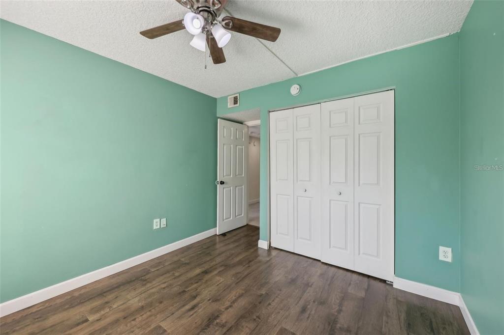 610 Cranes Way, Unit 207 Altamonte Springs, FL 32701 - Photo 11 of 27 a view of room with wooden floor and fan
