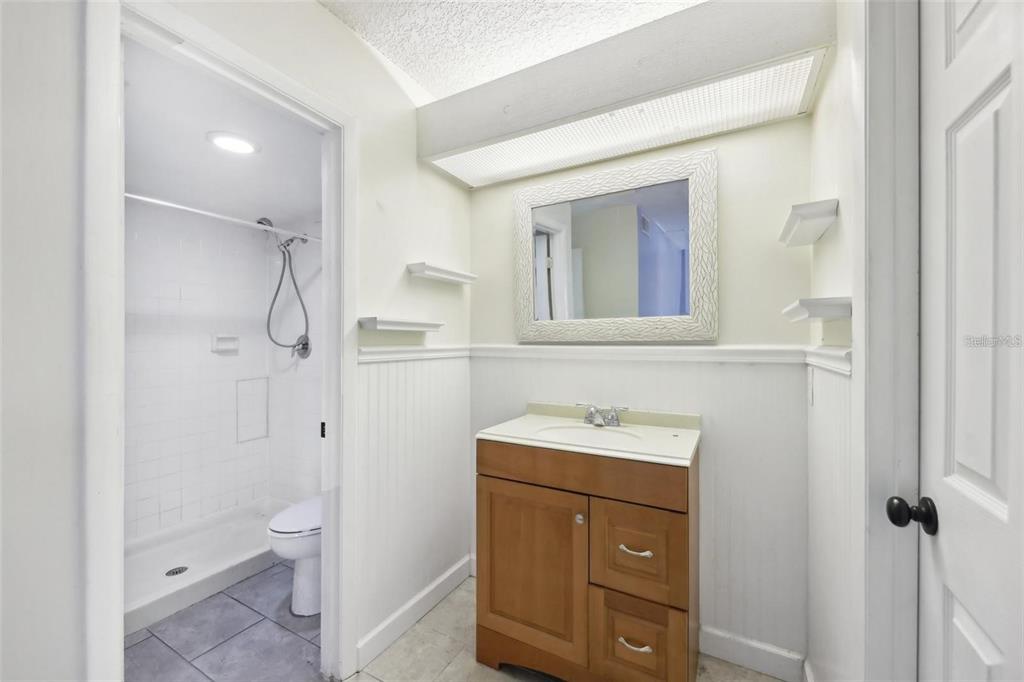 610 Cranes Way, Unit 207 Altamonte Springs, FL 32701 - Photo 16 of 27 a bathroom with a sink a toilet and shower