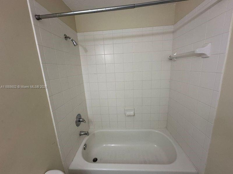 1260 Southeast 29th Street, Unit 20359 Homestead, FL 33035 - Photo 11 of 19 a close up of a bathtub in a bathroom