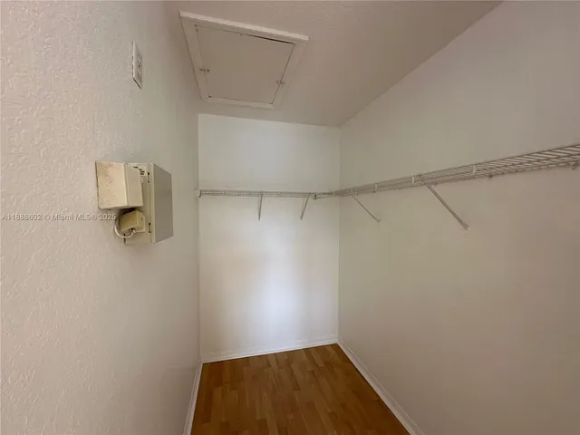 a view of a room with racks on the wall