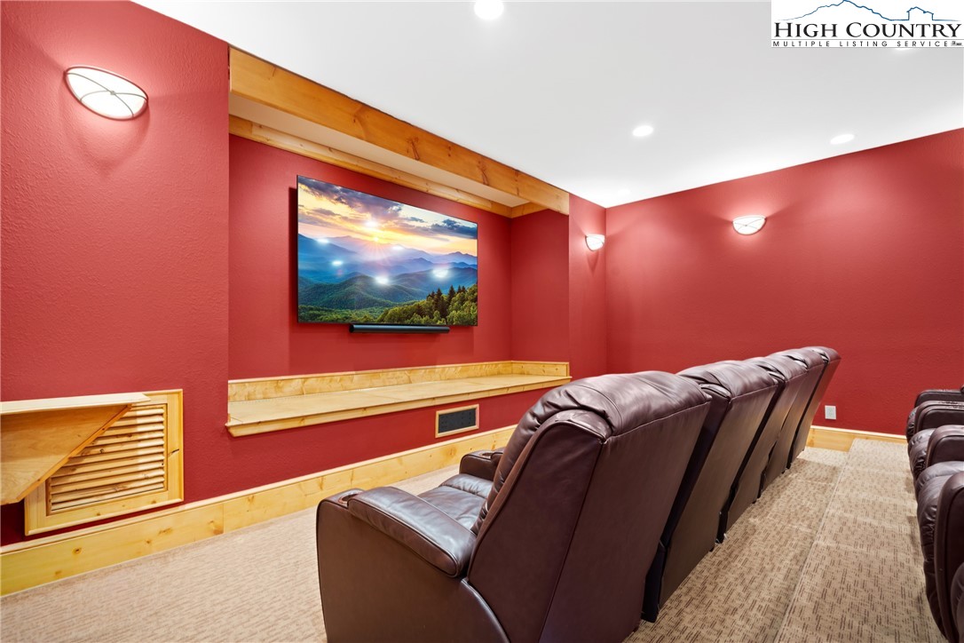 138 Springhouse Drive, Unit C2 Elk Park, NC 28622 - Photo 38 of 44 a living room with furniture and a flat screen tv