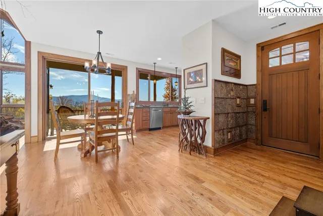 a view of balcony with wooden floor