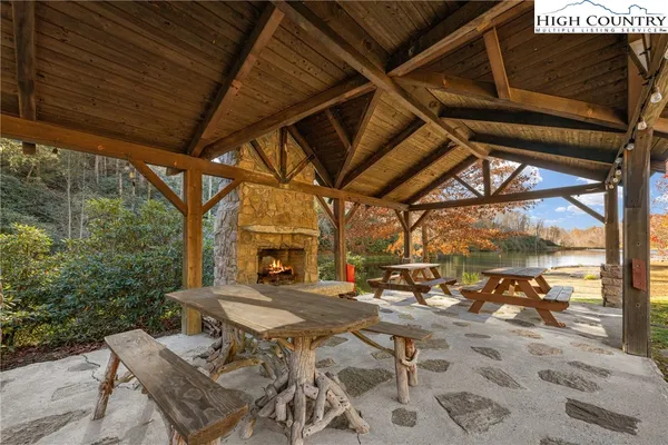 a view of yard with patio