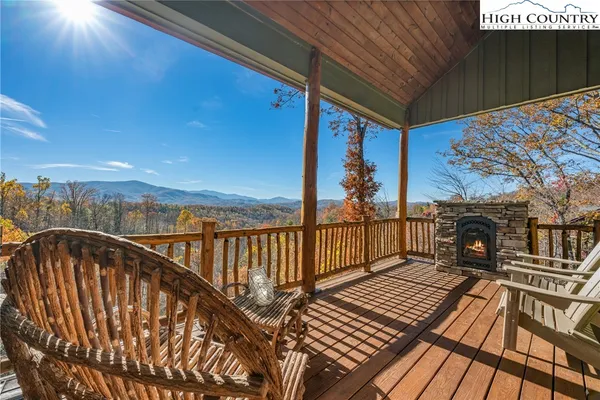 a view of balcony with wooden floor