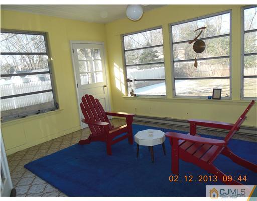 25 Penn Lyle Road West Windsor, NJ 08550 - Photo 14 of 25 a living room with furniture and a window