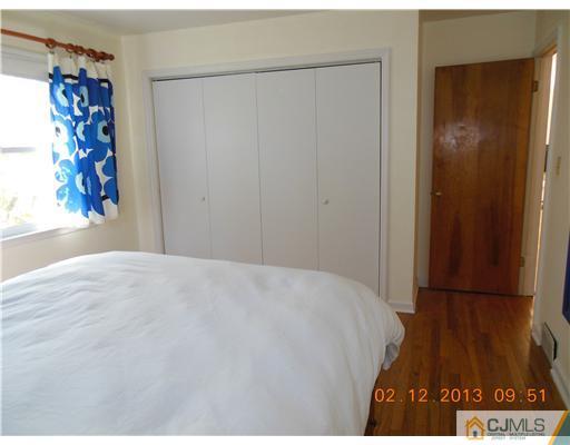 25 Penn Lyle Road West Windsor, NJ 08550 - Photo 18 of 25 a bedroom with a bed and a window
