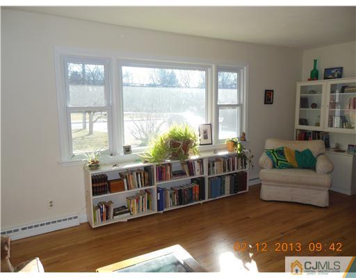 25 Penn Lyle Road West Windsor, NJ 08550 - Photo 5 of 25 a living room with furniture and a window