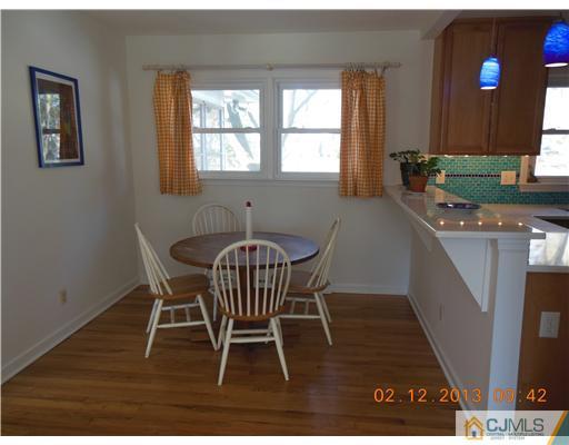 25 Penn Lyle Road West Windsor, NJ 08550 - Photo 7 of 25 a view of a dining room with furniture and window