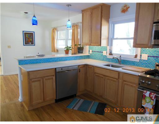 25 Penn Lyle Road West Windsor, NJ 08550 - Photo 9 of 25 a kitchen with a sink and cabinets