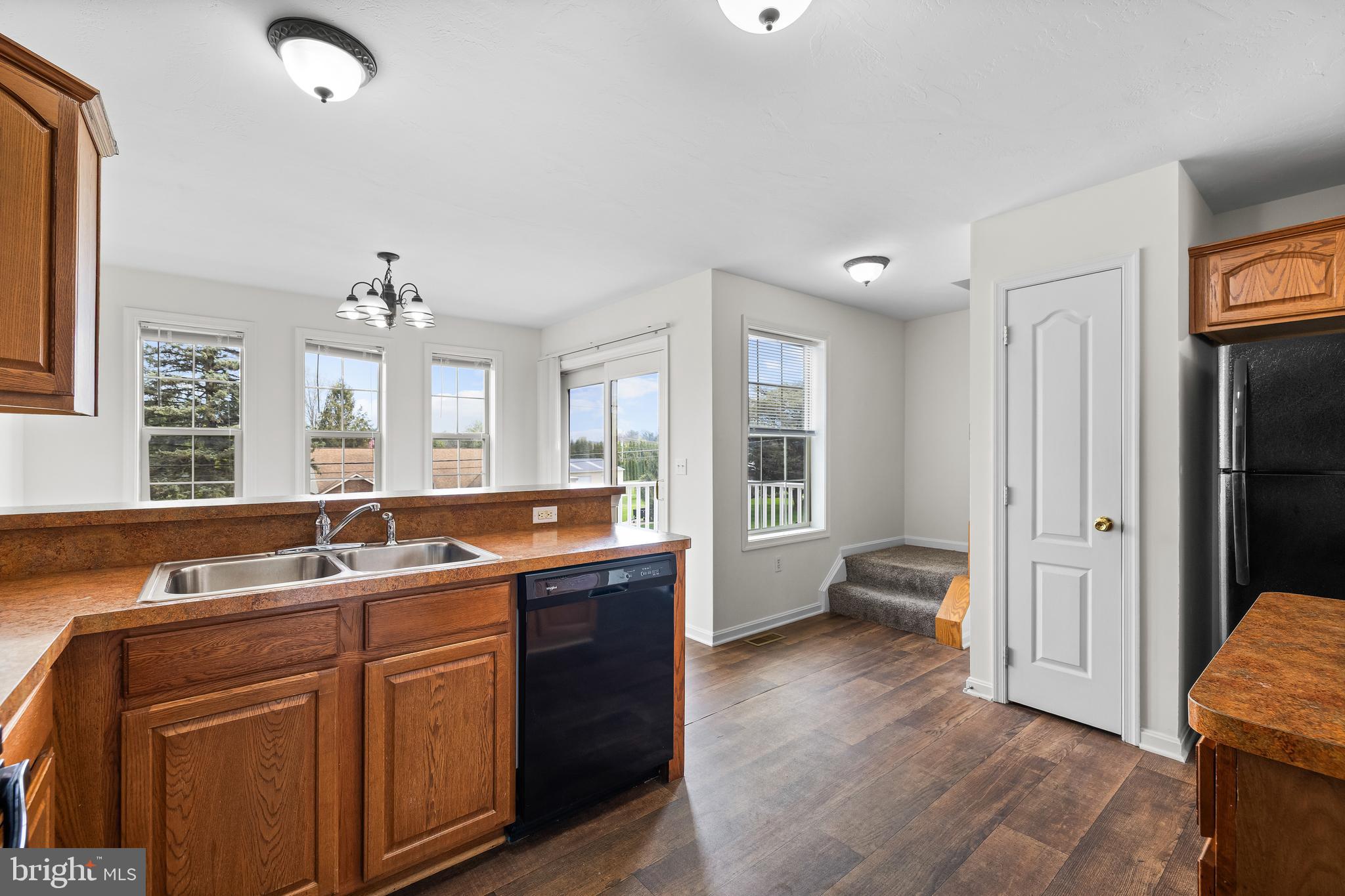 22 Shady Tree Court York, PA 17402 - Photo 8 of 23 a spacious bathroom with a granite countertop sink and a large mirror