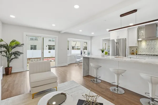 a living room with furniture and a table