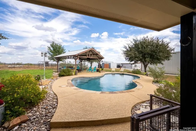 an aerial view of beach and ocean