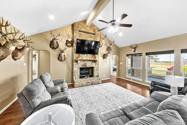 a large kitchen with a table and chairs