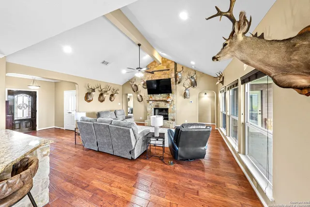 a kitchen with stainless steel appliances granite countertop a refrigerator sink and cabinets