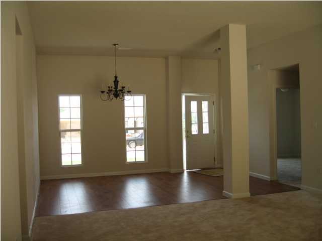 5216 Moore Loop Crestview, FL 32536 - Photo 5 of 5 a view of a room with window and hardwood floor