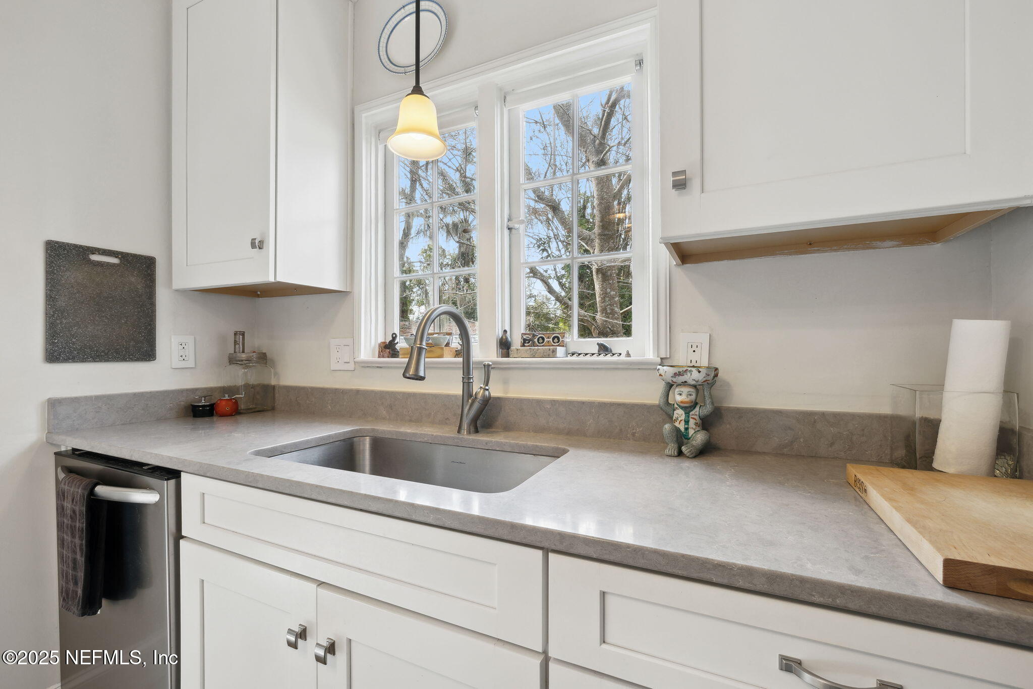 4608 Post Street Jacksonville, FL 32205 - Photo 14 of 49 a kitchen with a sink and a window