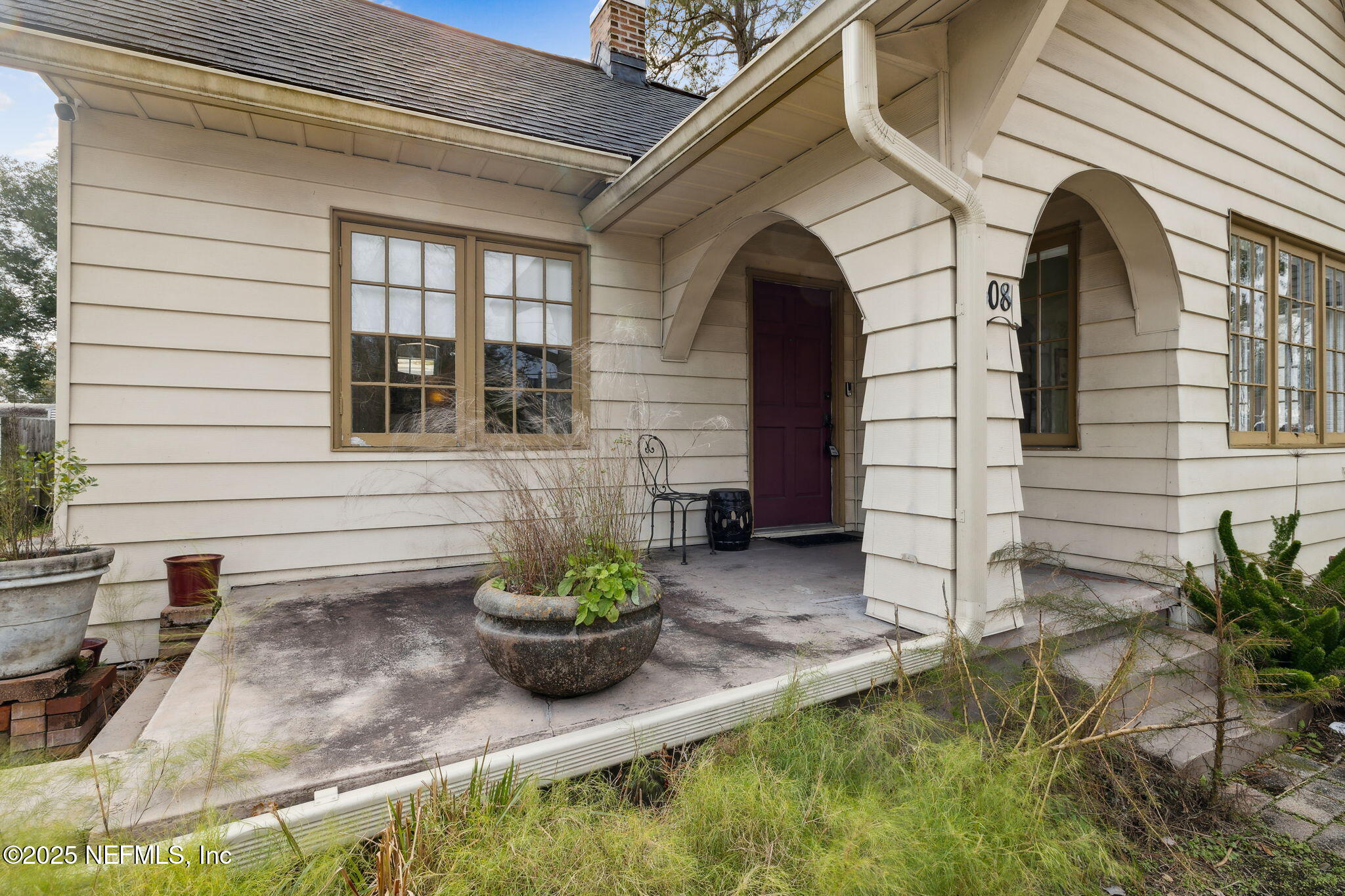 4608 Post Street Jacksonville, FL 32205 - Photo 3 of 49 a front view of a house with garden