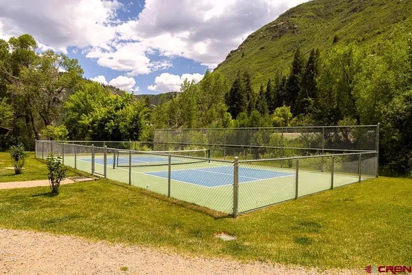 a view of swimming pool with a garden