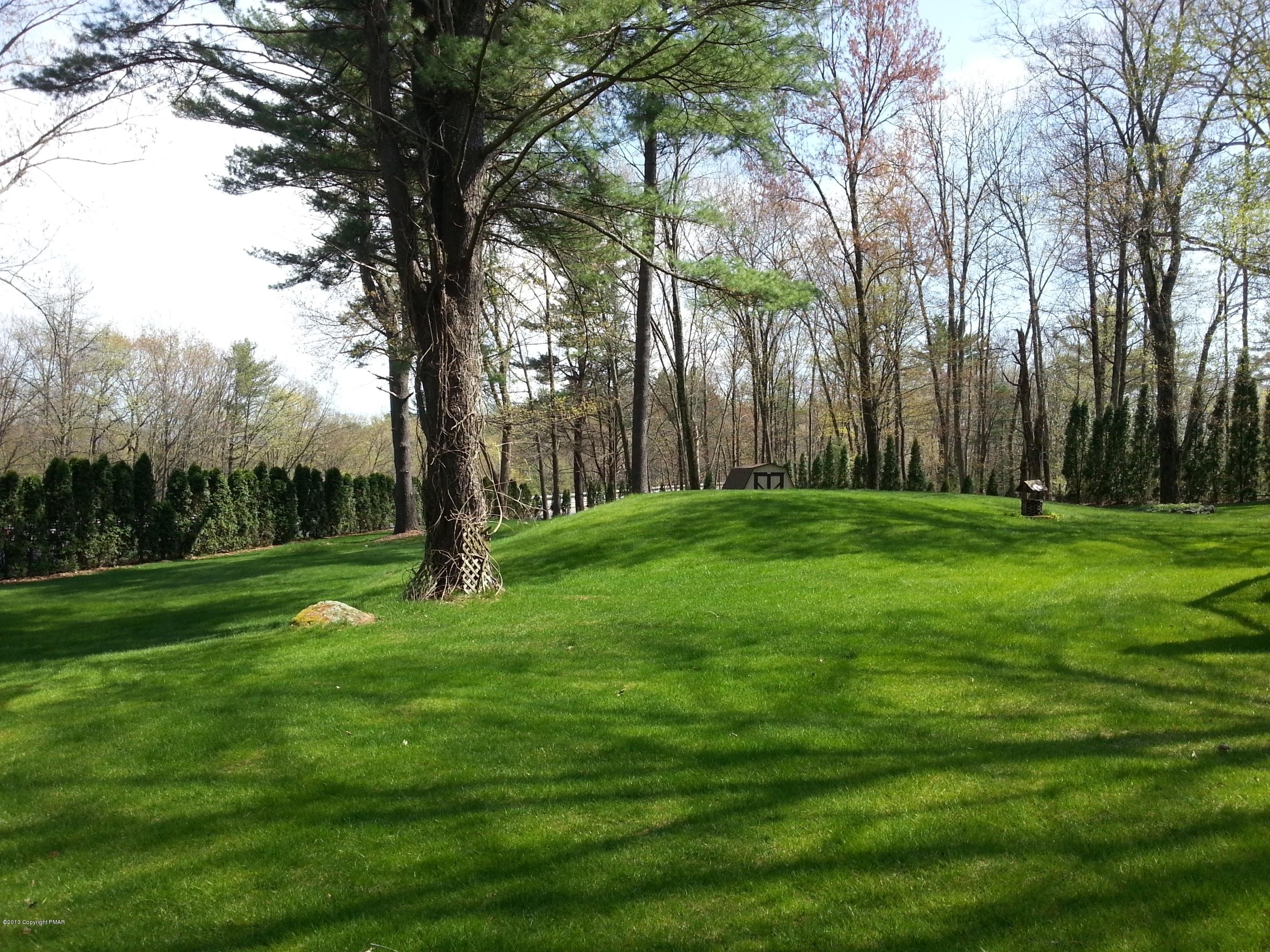 2187 Shafer Road Stroudsburg, PA 18360 - Photo 23 of 29 a backyard of a house with lots of green space