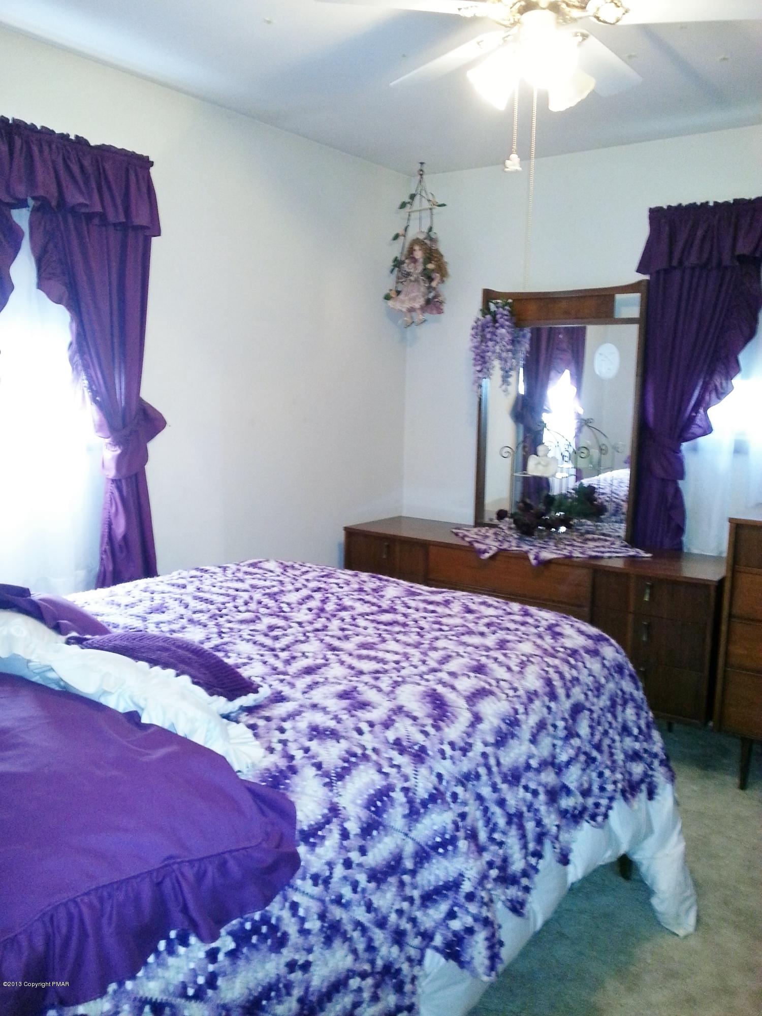 2187 Shafer Road Stroudsburg, PA 18360 - Photo 10 of 29 a bedroom with a bed and a mirror