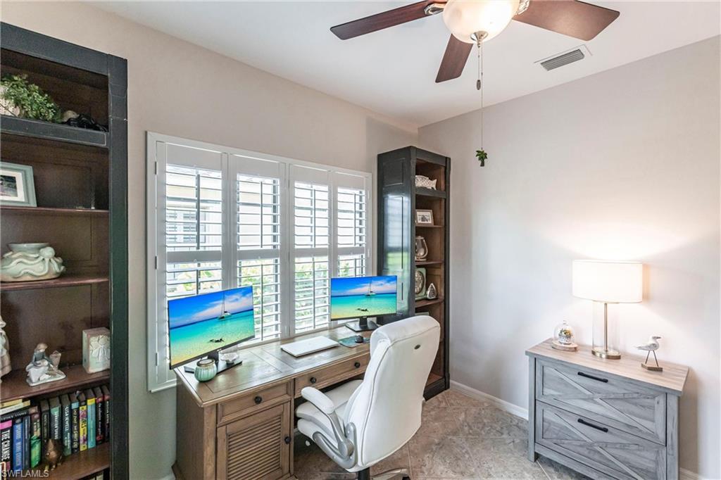 4565 Waterscape Lane Fort Myers, FL 33966 - Photo 23 of 42 Home office with baseboards, visible vents, and ceiling fan