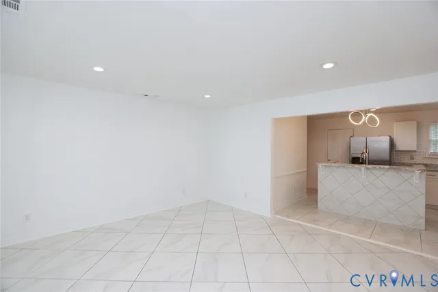 a view of a kitchen with a sink
