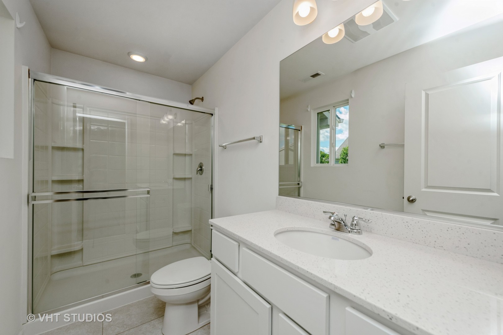 1205 Prairie View Parkway Cary, IL 60013 - Photo 6 of 14 a bathroom with a sink toilet and shower