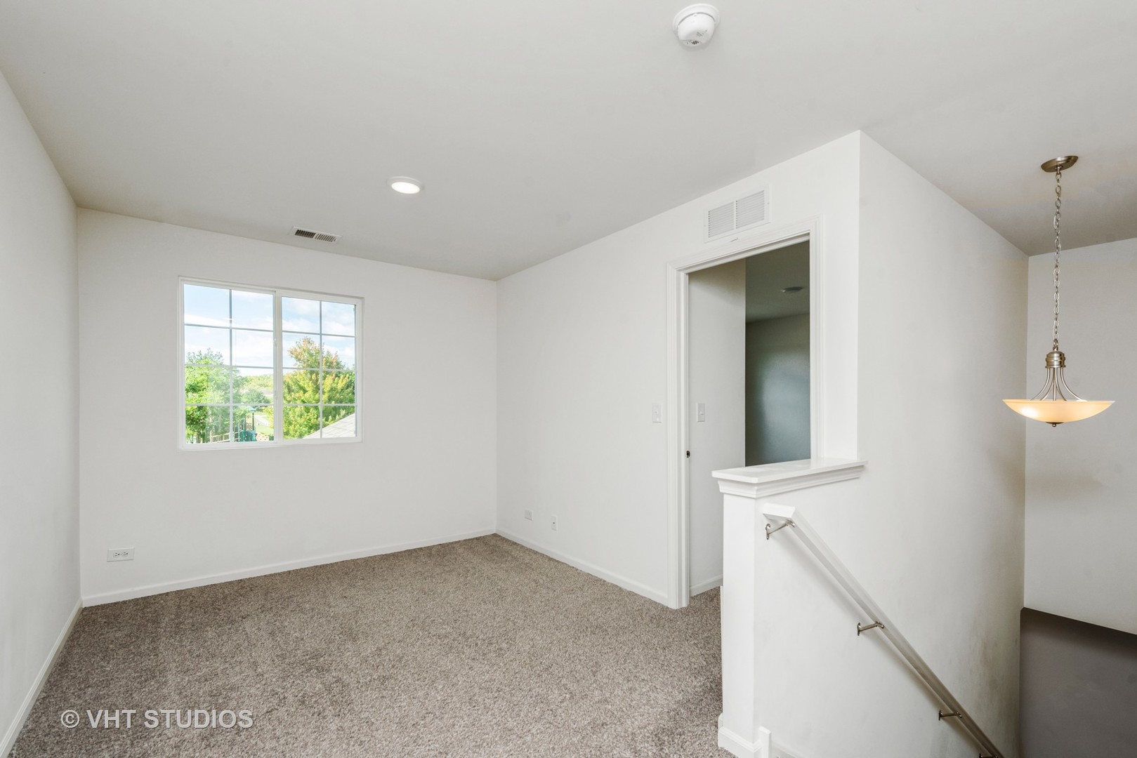 1205 Prairie View Parkway Cary, IL 60013 - Photo 9 of 14 a view of an empty room with a window