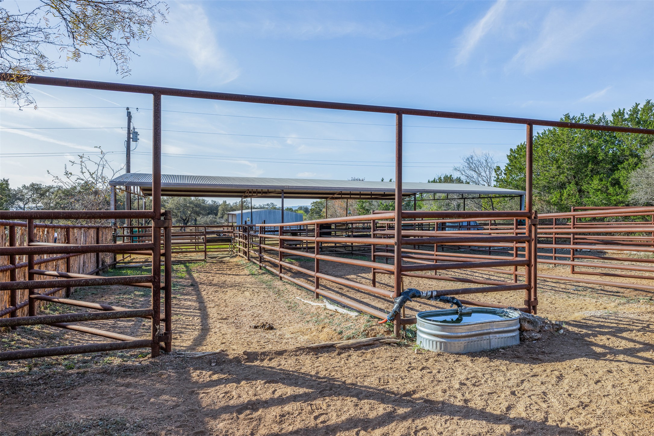 27701 Turner Ranch Road Marble Falls, TX 78654 - Photo 32 of 40 View of yard featuring an outdoor structure and an exterior structure