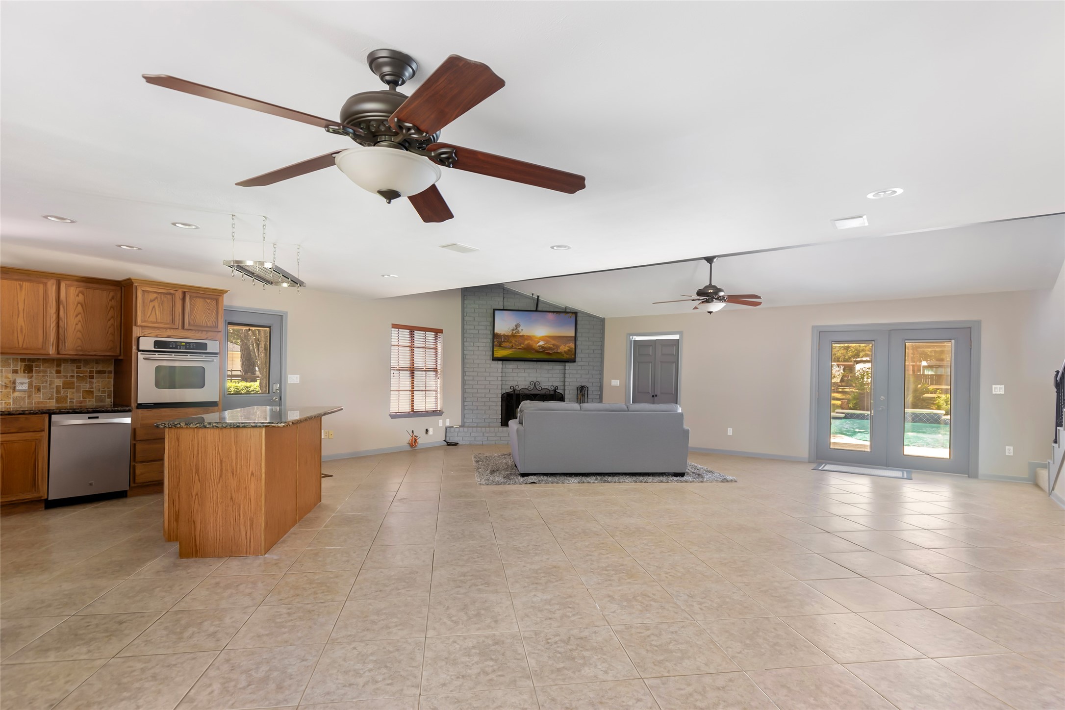 1300 Smith Road Huffman, TX 77336 - Photo 19 of 50 Spacious open concept kitchen and living area.
