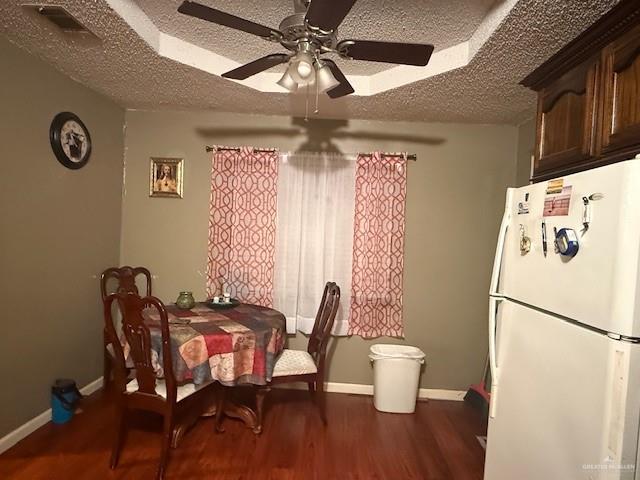 1507 Guerra Avenue Roma, TX 78584 - Photo 7 of 15 a kitchen with a refrigerator and a chandelier