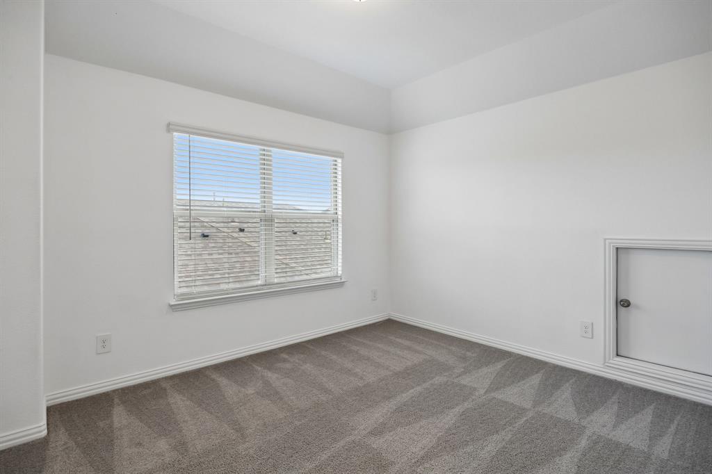 1303 Wheelwright Drive Forney, TX 75126 - Photo 30 of 39 2nd floor secondary bedroom #2
