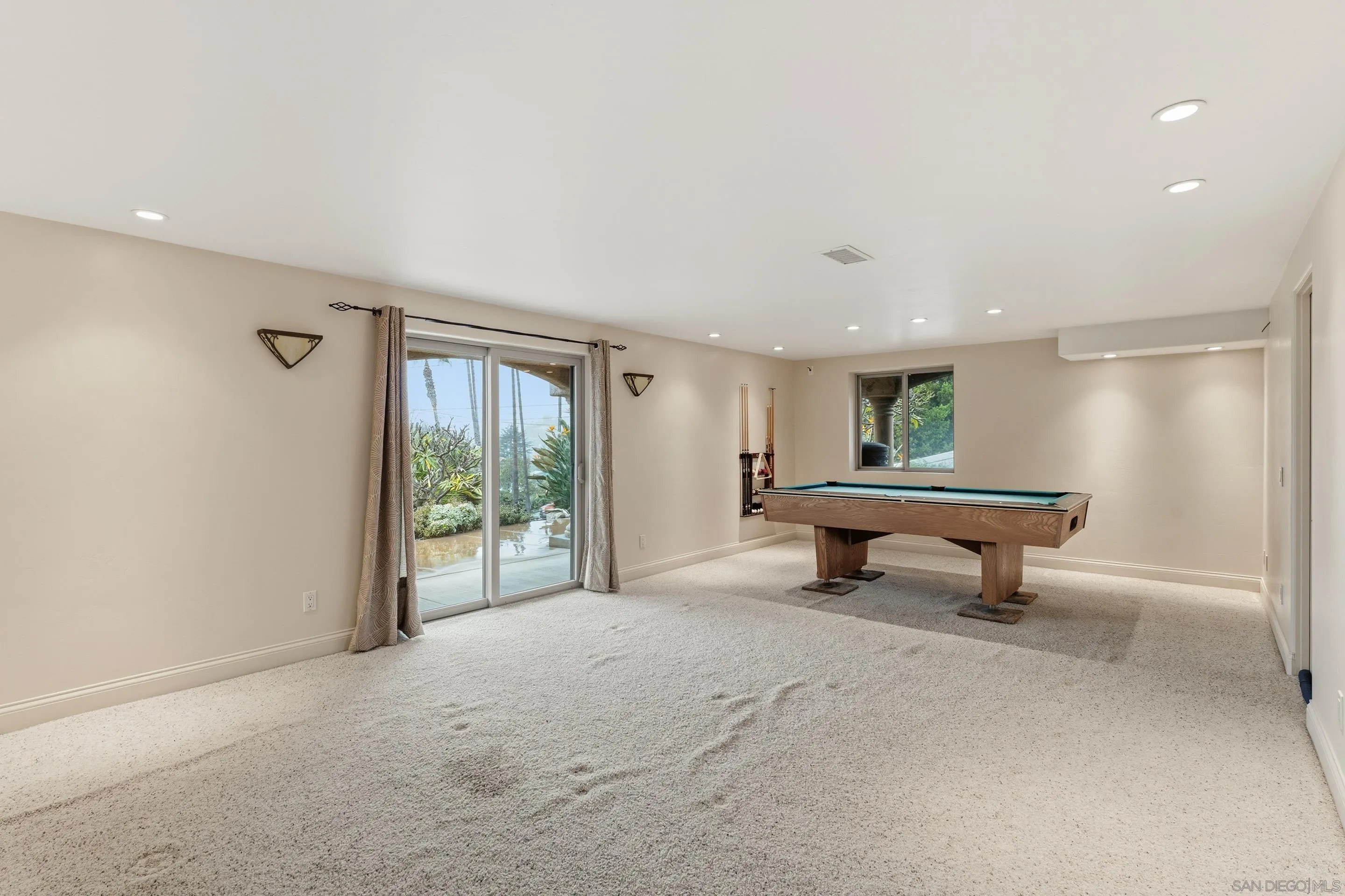 11020 Explorer Road El Cajon, CA 92020 - Photo 13 of 29 a living room with furniture a window and a table