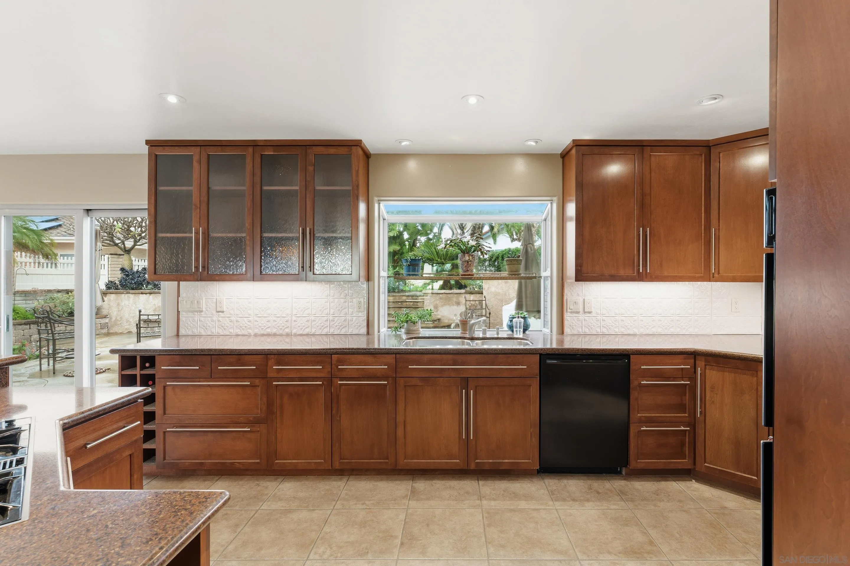 11020 Explorer Road El Cajon, CA 92020 - Photo 14 of 29 a kitchen with a sink and a window