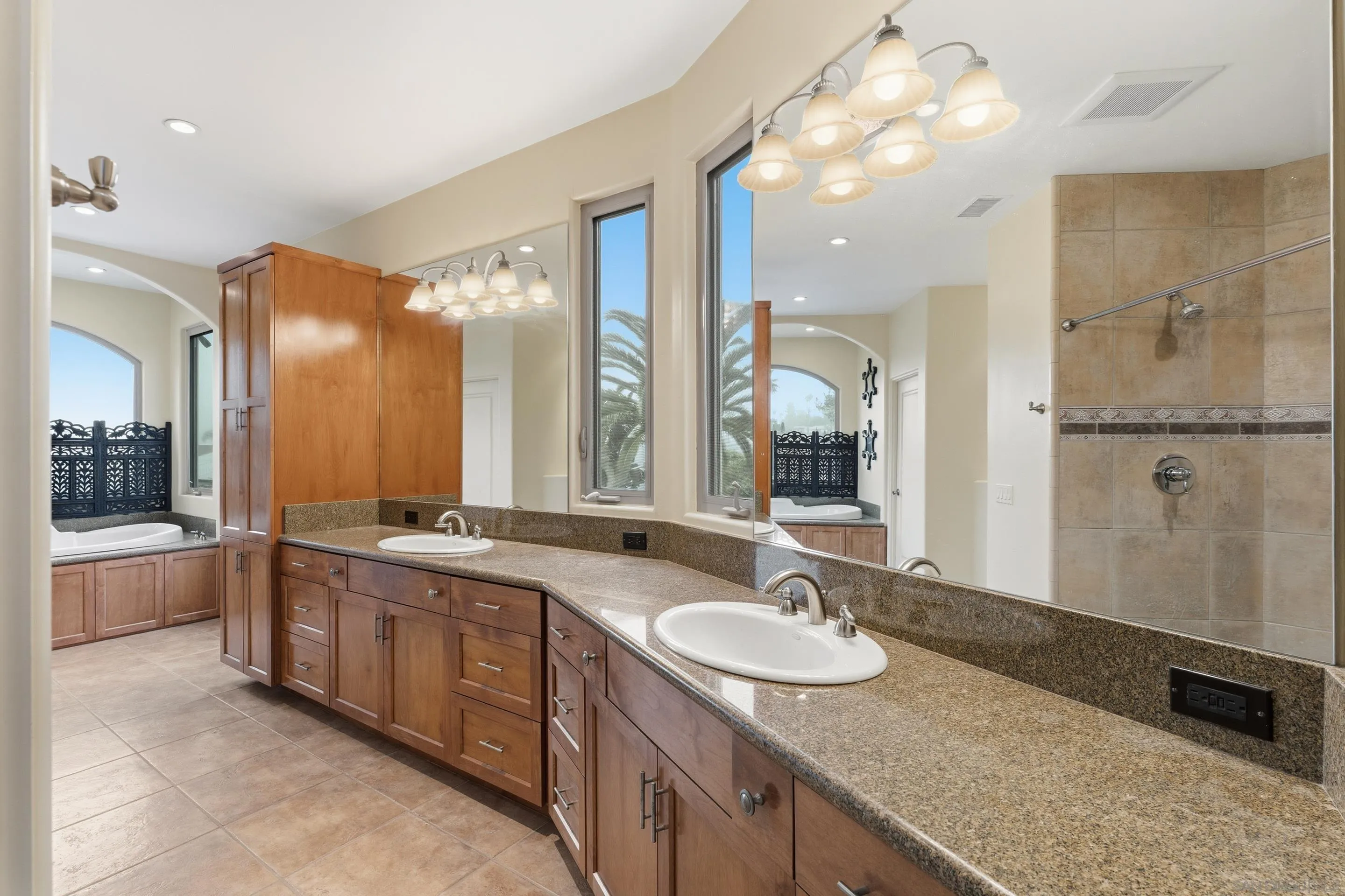 11020 Explorer Road El Cajon, CA 92020 - Photo 17 of 29 a large bathroom with a granite countertop sink and a large mirror