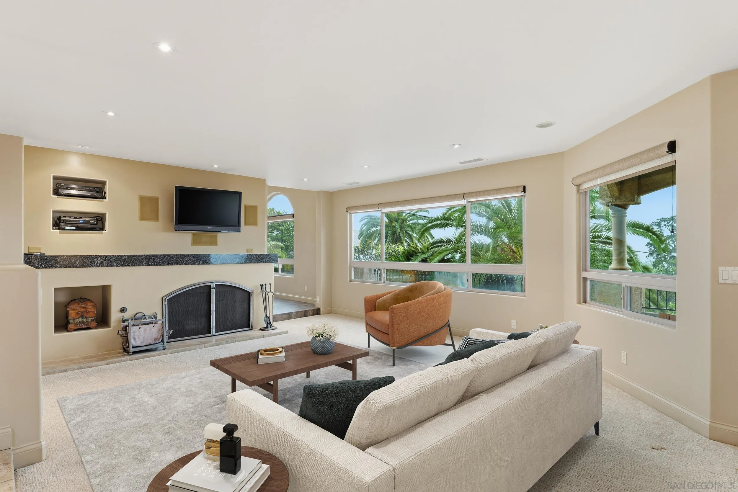 11020 Explorer Road El Cajon, CA 92020 - Photo 2 of 29 a living room with furniture a fireplace and a flat screen tv