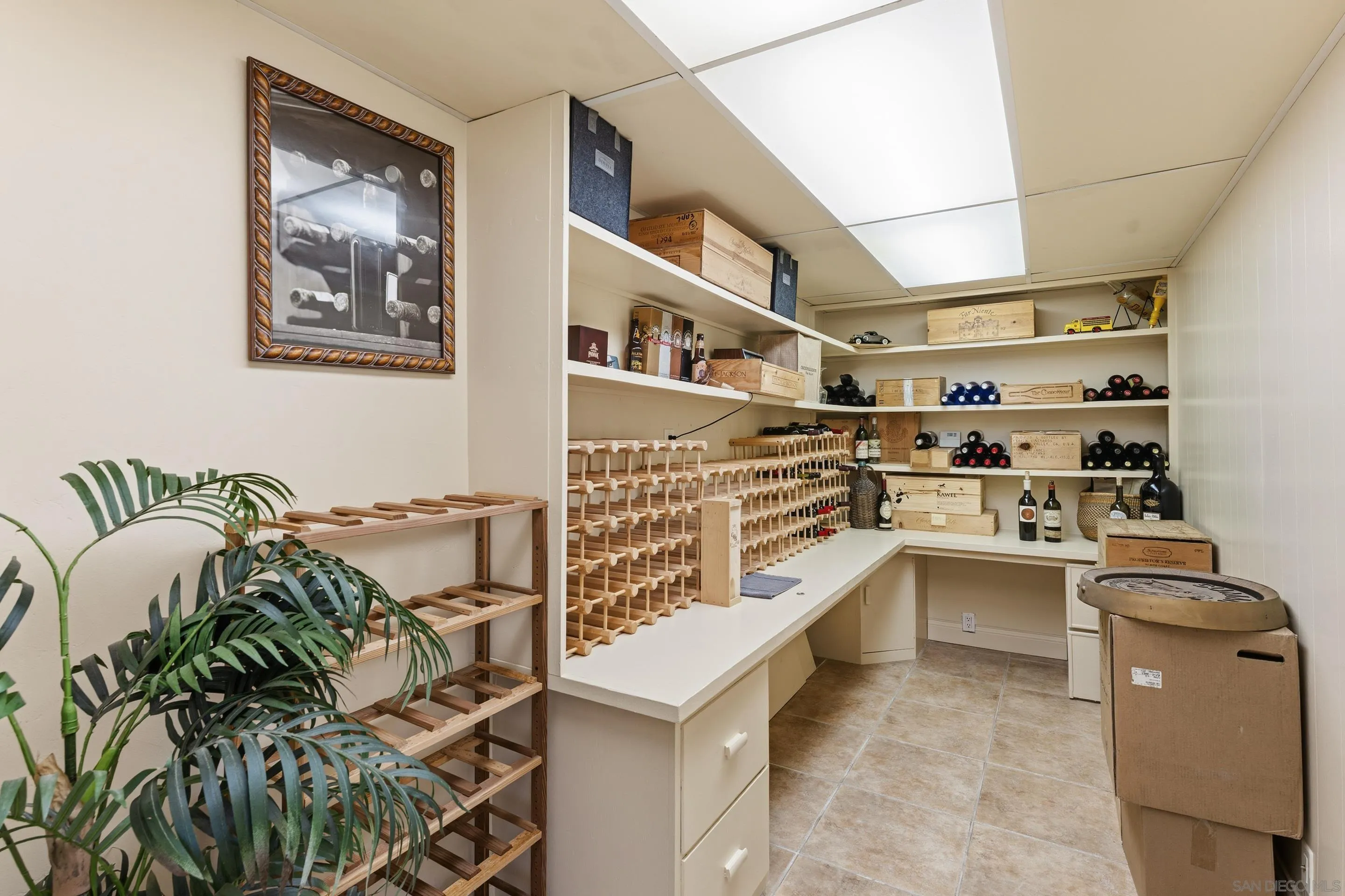 11020 Explorer Road El Cajon, CA 92020 - Photo 23 of 29 a kitchen with stainless steel appliances a stove a chimney a sink and cabinets