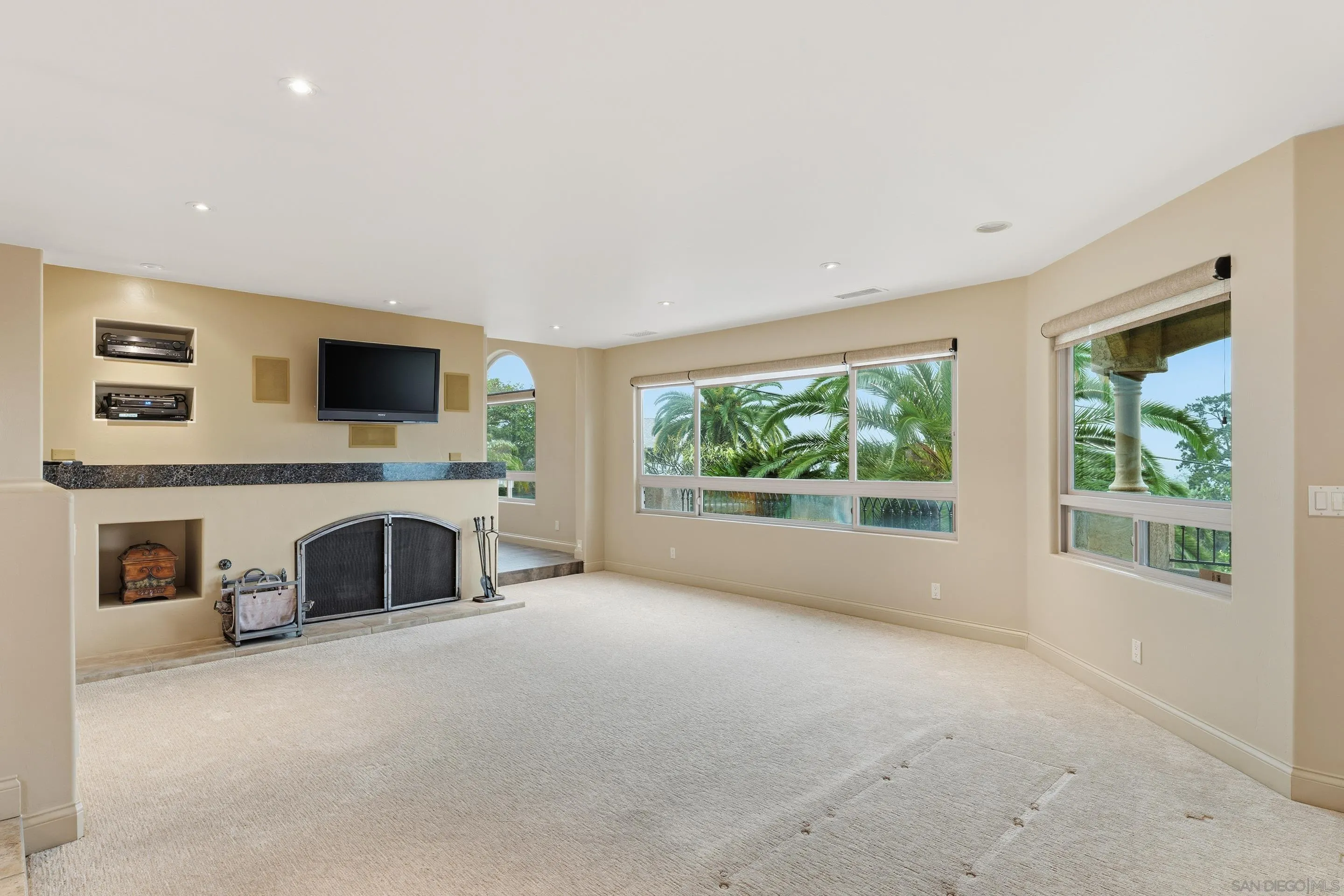 11020 Explorer Road El Cajon, CA 92020 - Photo 3 of 29 a living room with fireplace furniture and a flat screen tv