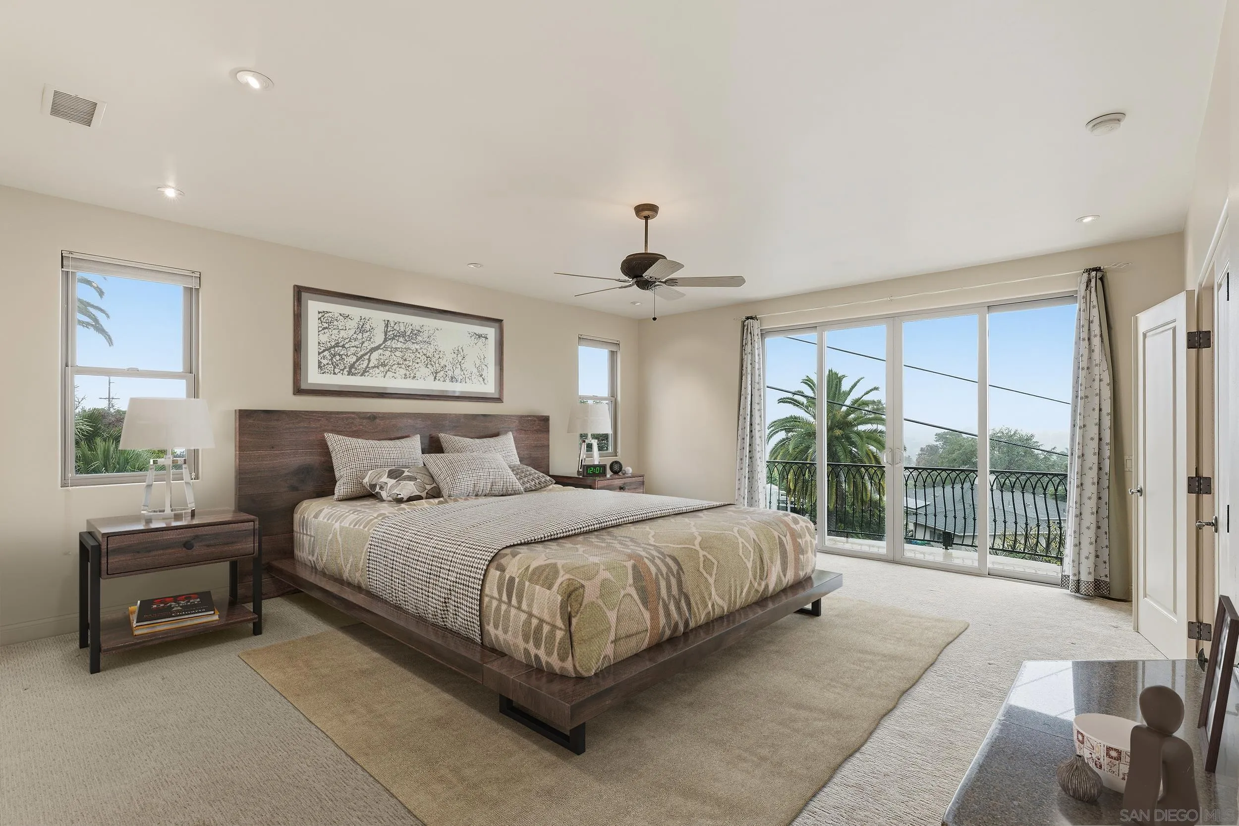 11020 Explorer Road El Cajon, CA 92020 - Photo 10 of 29 a bedroom with a large bed and a large window