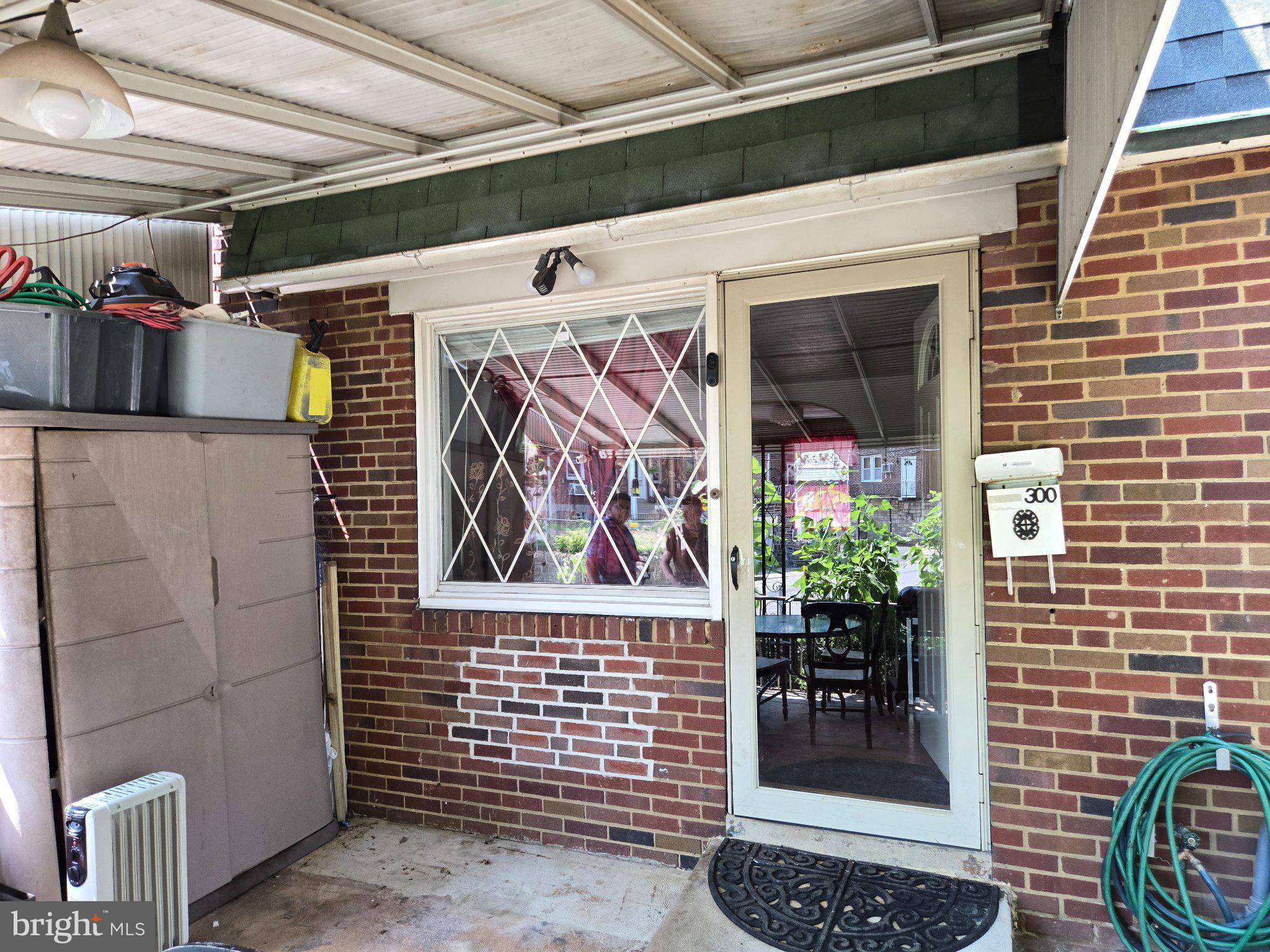 300 Springton Road Upper Darby, PA 19082 - Photo 14 of 19 Charming entryway with brick accents.