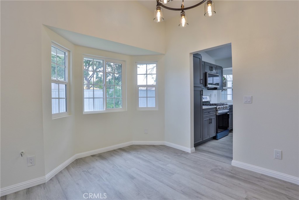 45800 Classic Way Temecula, CA 92592 - Photo 13 of 61 wooden floor in an empty room with a window