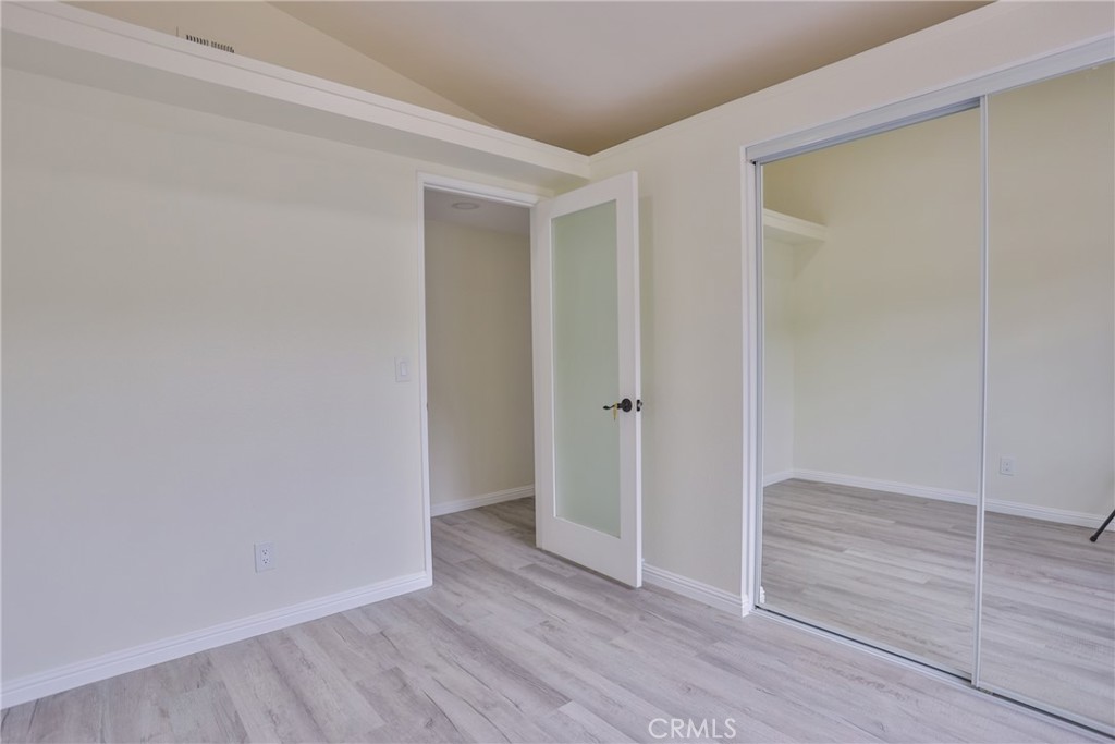 45800 Classic Way Temecula, CA 92592 - Photo 31 of 61 an empty room with wooden floor