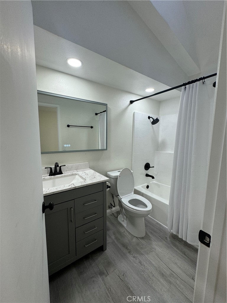 45800 Classic Way Temecula, CA 92592 - Photo 33 of 61 a bathroom with a double vanity sink toilet and shower