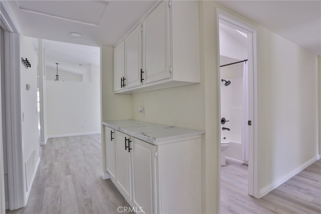 45800 Classic Way Temecula, CA 92592 - Photo 37 of 61 a utility room with cabinets
