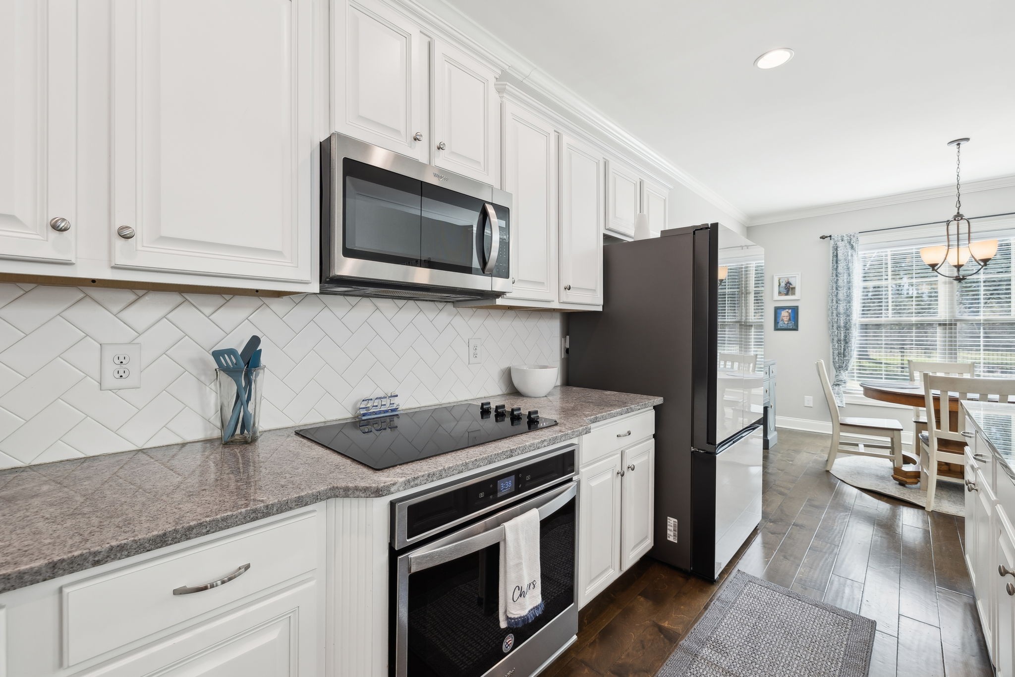 109 Watermill Lane Lebanon, TN 37087 - Photo 11 of 69 a kitchen with granite countertop a sink stove and refrigerator