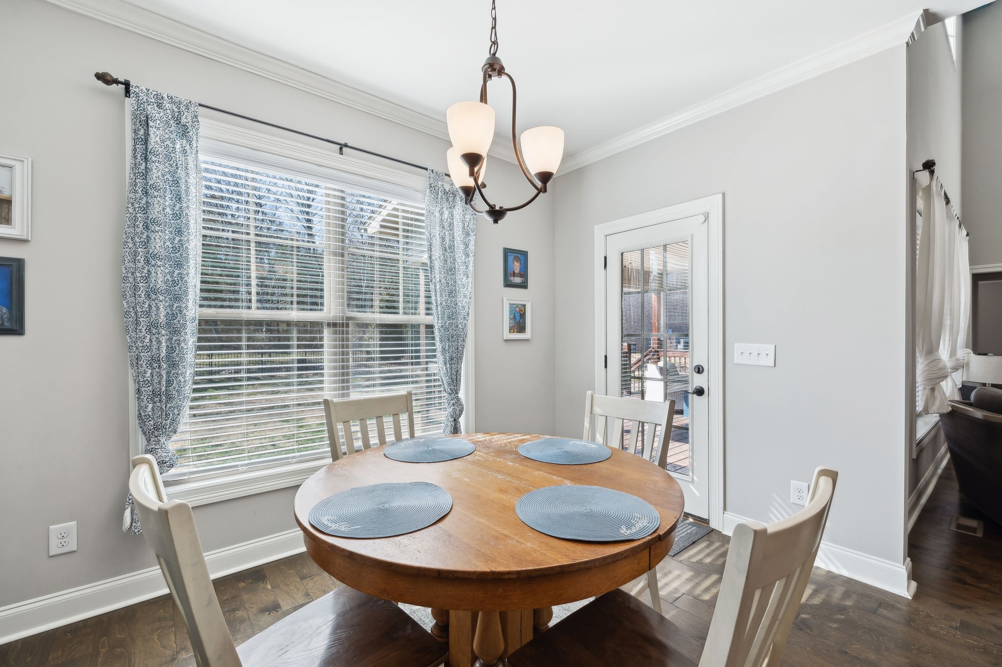 109 Watermill Lane Lebanon, TN 37087 - Photo 22 of 69 a dining room with furniture a chandelier and wooden floor