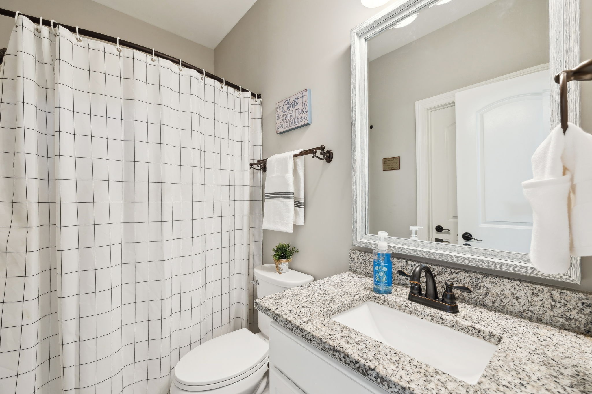 109 Watermill Lane Lebanon, TN 37087 - Photo 29 of 69 a bathroom with a granite countertop toilet sink and mirror