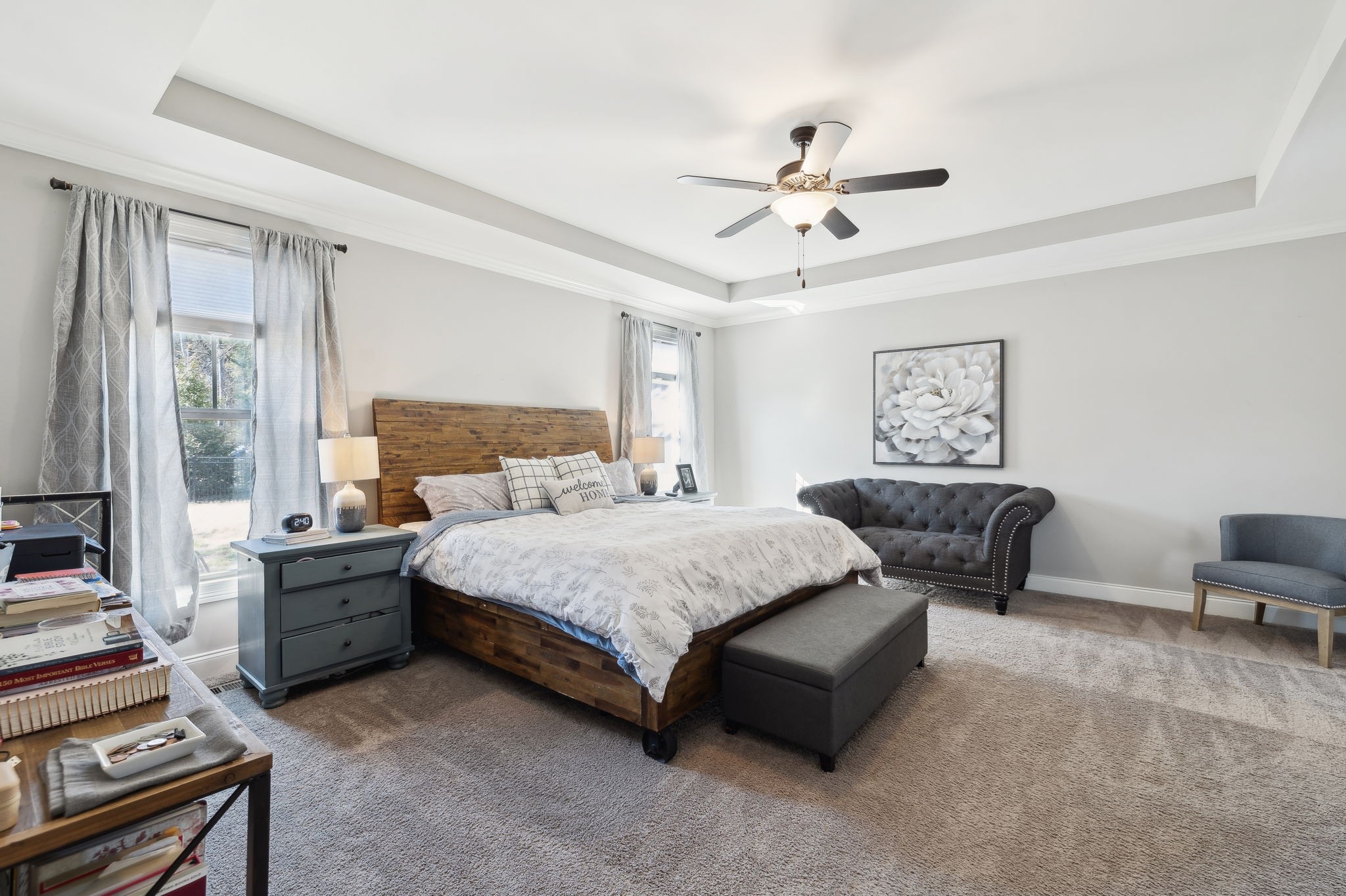 109 Watermill Lane Lebanon, TN 37087 - Photo 33 of 69 a spacious bedroom with a bed and a chandelier