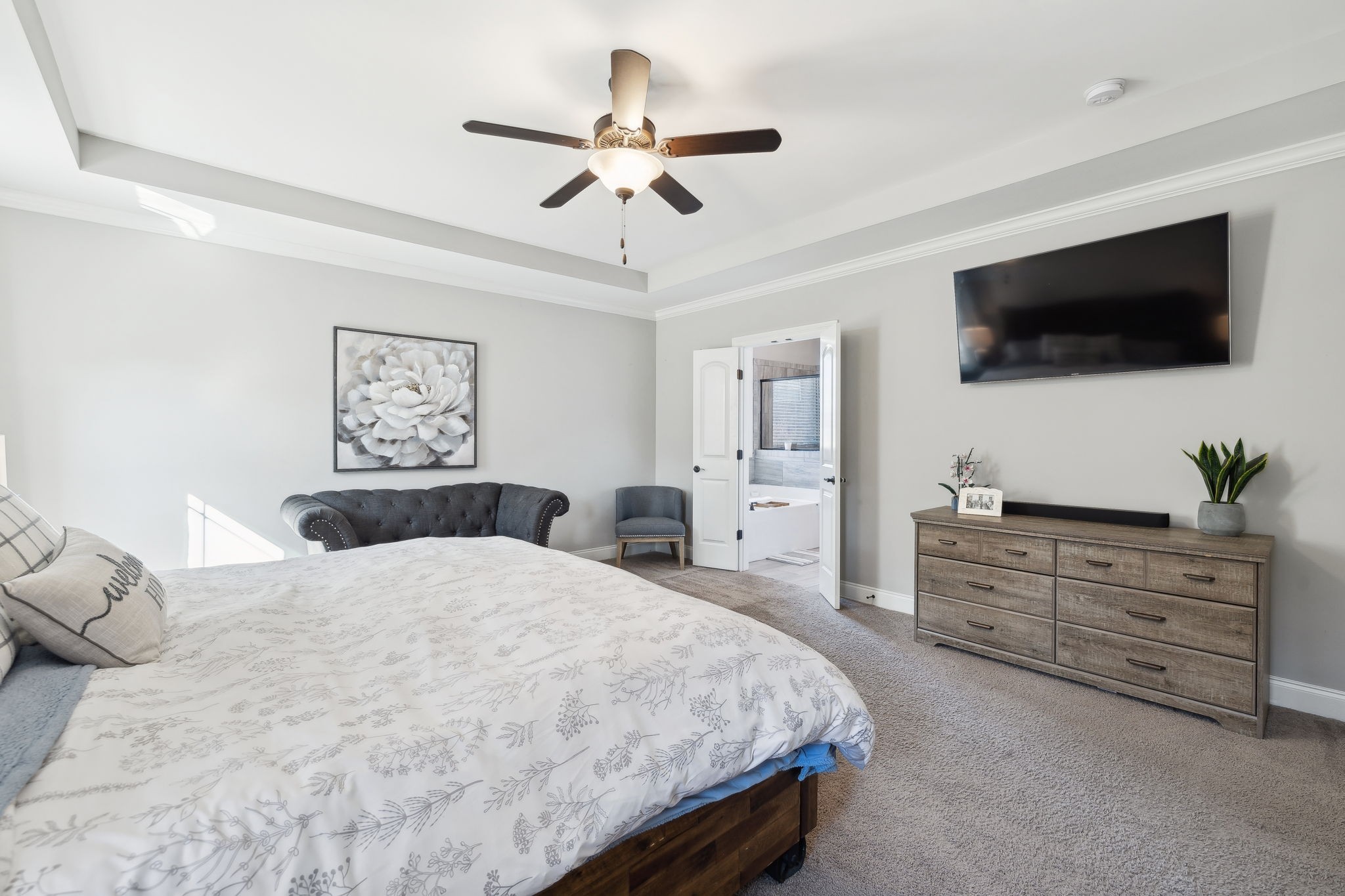 109 Watermill Lane Lebanon, TN 37087 - Photo 34 of 69 a bedroom with a large bed and a flat screen tv