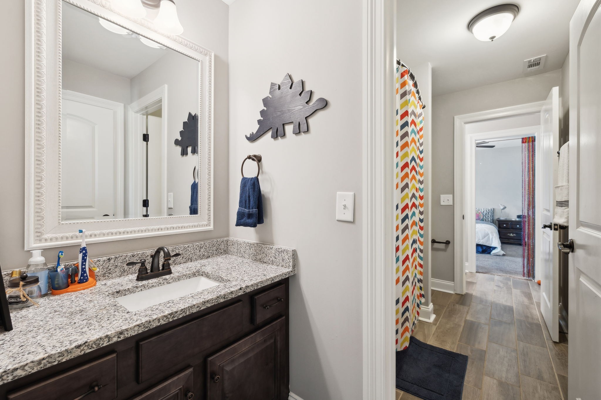 109 Watermill Lane Lebanon, TN 37087 - Photo 47 of 69 a bathroom with a granite countertop sink and a mirror